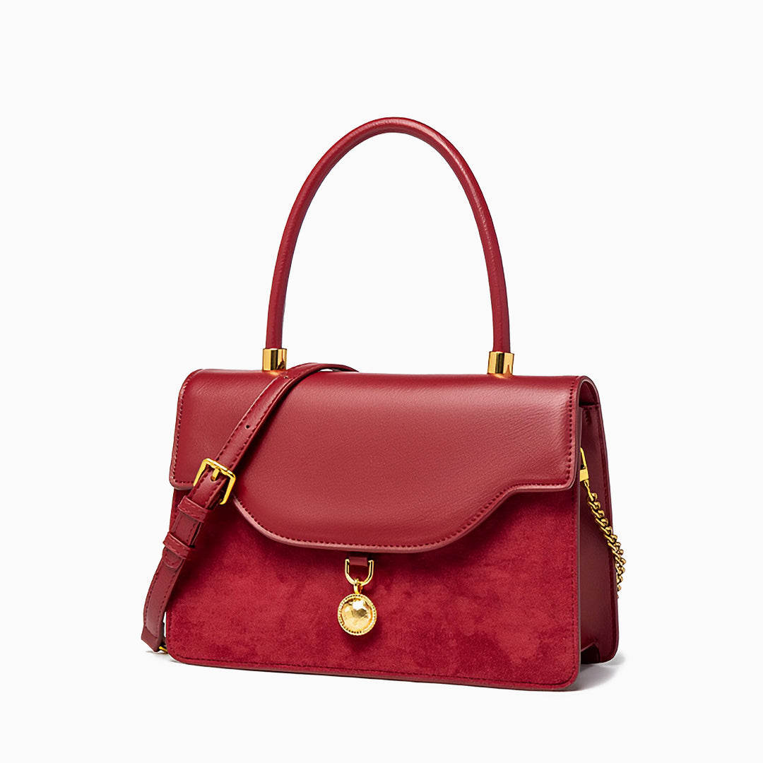 Regal Charm Suede Handbag