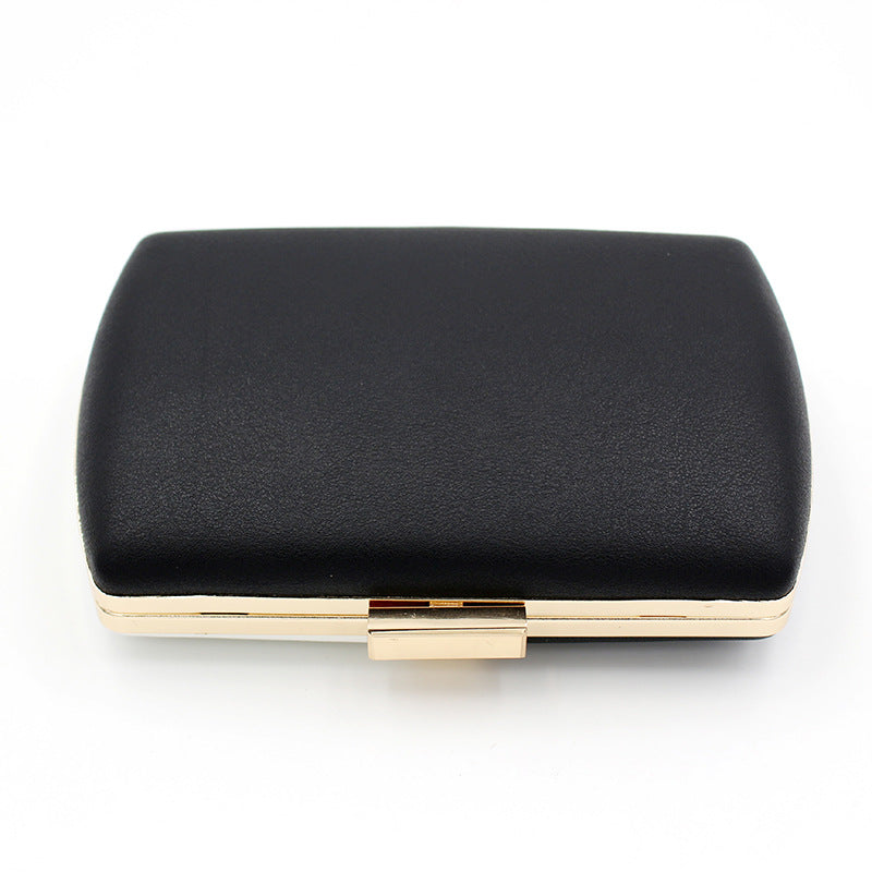 Cheryl Gold Strip Clutch Bag