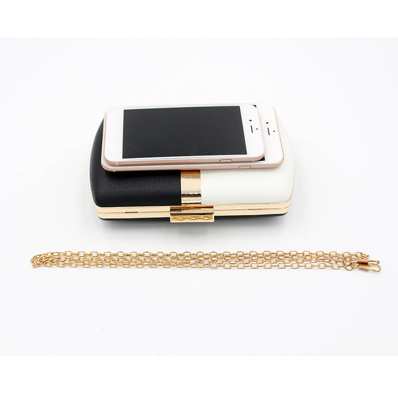 Cheryl Gold Strip Clutch Bag