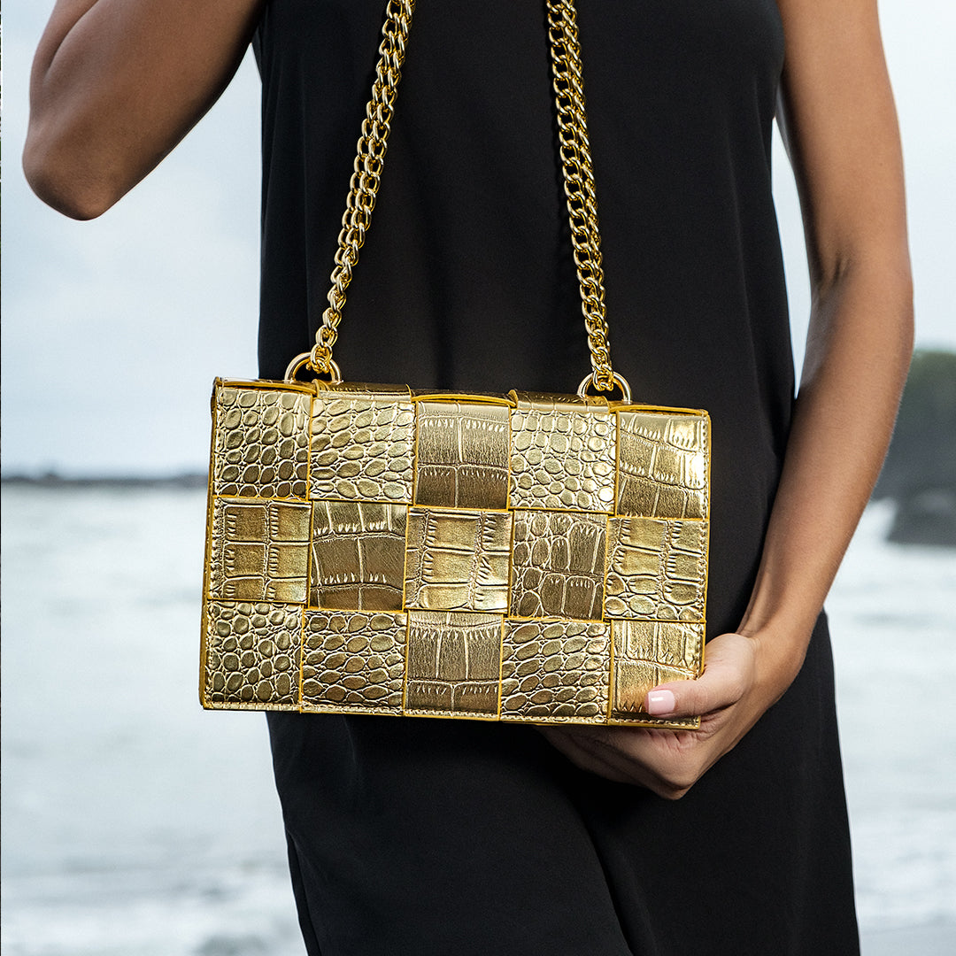 Gold croc bag hotsell